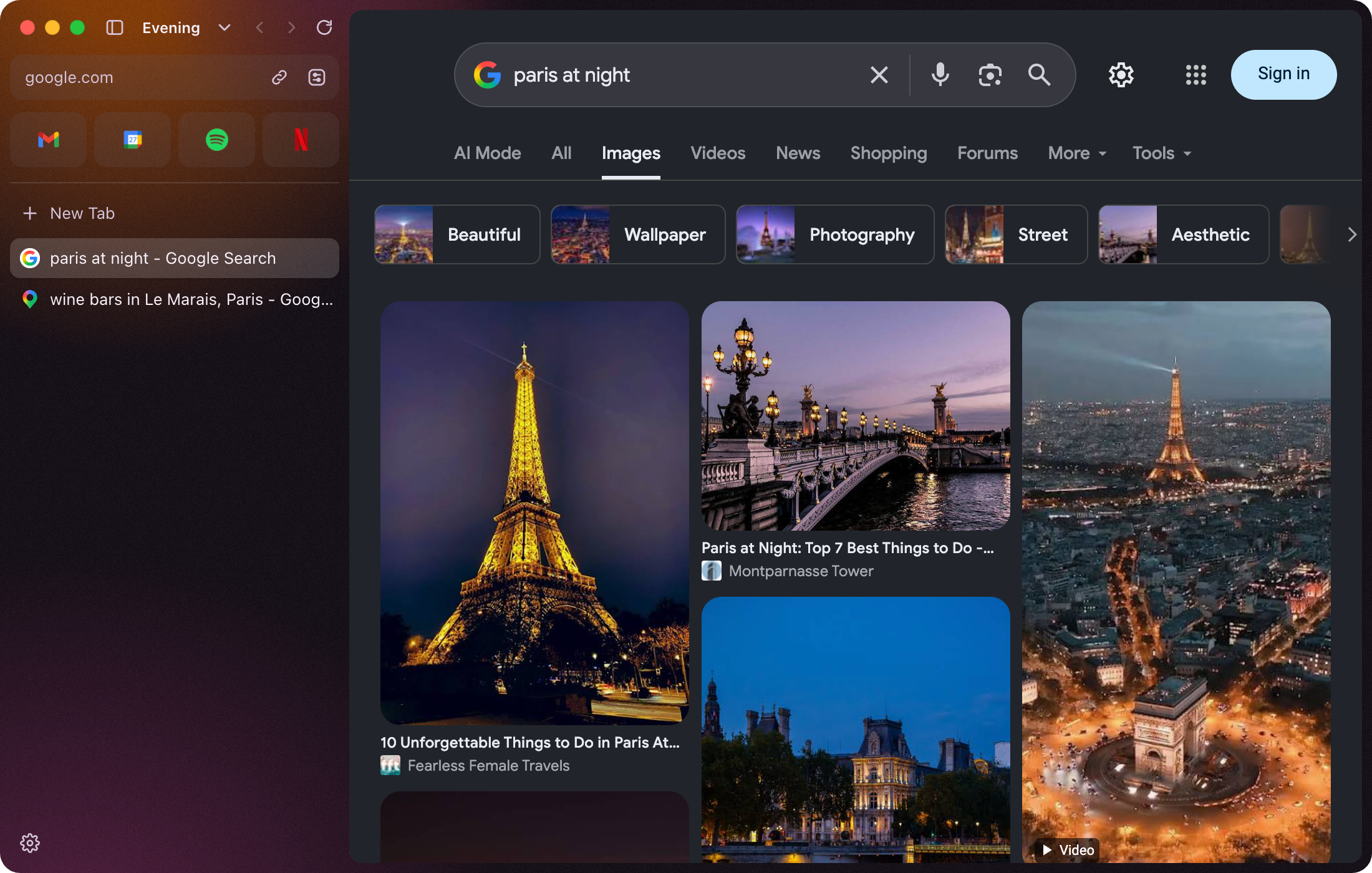 A space called Evening, in dark orange, with Google Images showing Paris at night, in dark mode.